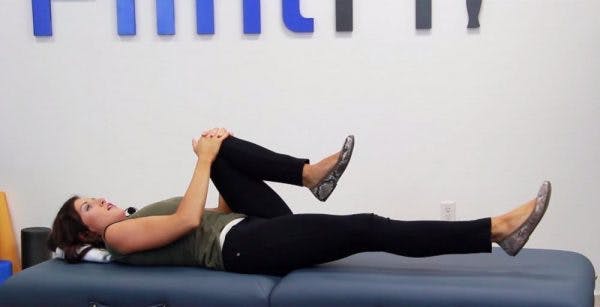 knees-to-chest-core-stroke-exercise