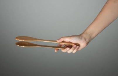 picking-up-items-with-tongs-to-recover-fine-motor-skills-after-stroke